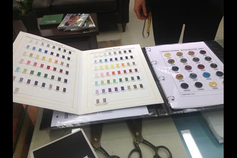 Customers can choose buttons and threads in the tailoring department at Marks and Spencer, Westfield London